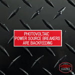 White on Red Panel Tag - "Photovoltaic Power Source Breakers..."