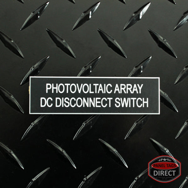 White on Black Panel Tag - "Photovoltaic Array DC Disconnect Switch"