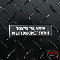 White on Black Panel Tag - "Photovoltaic System Utility Disconnect Switch" (2 Lines)